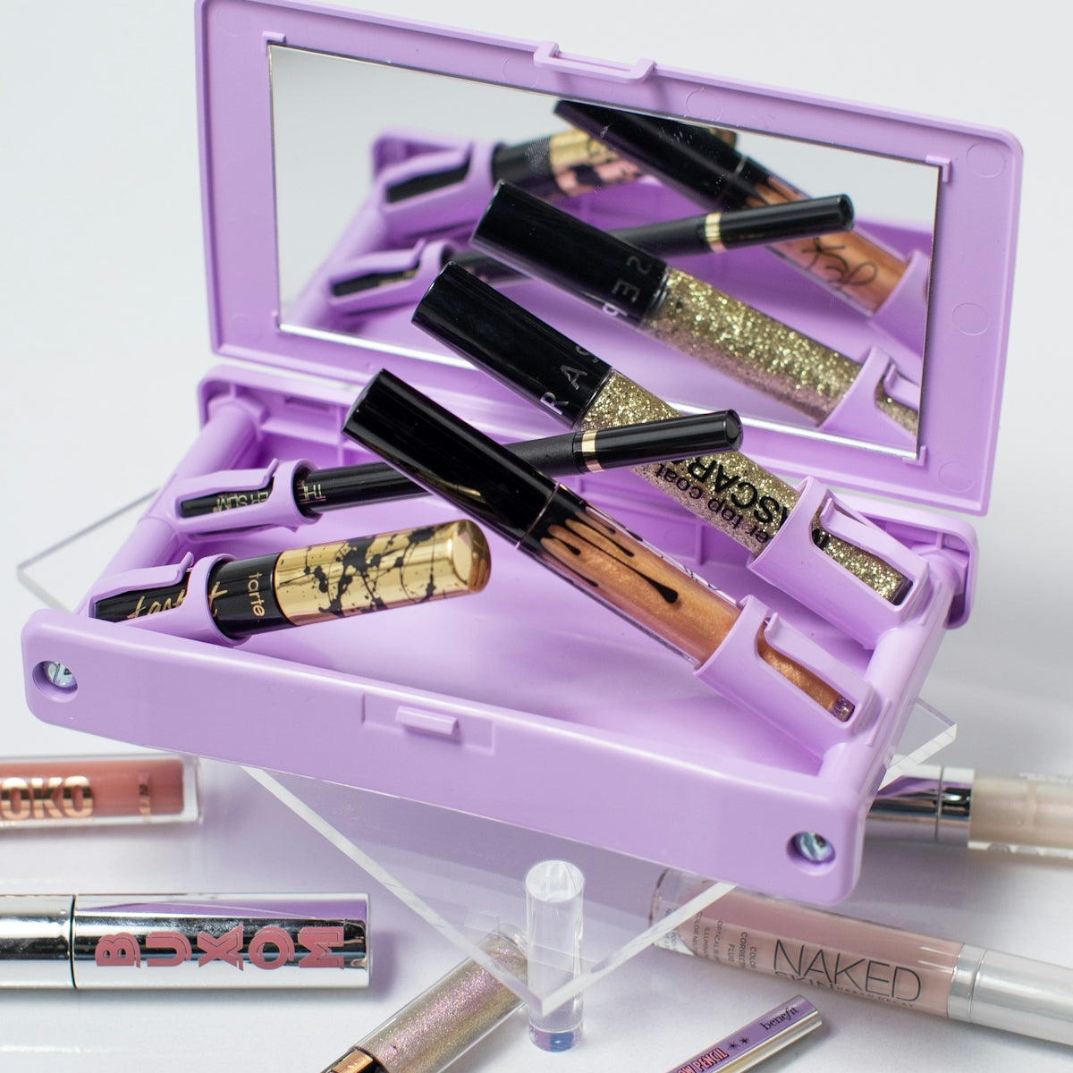 black and purple lipstick in box