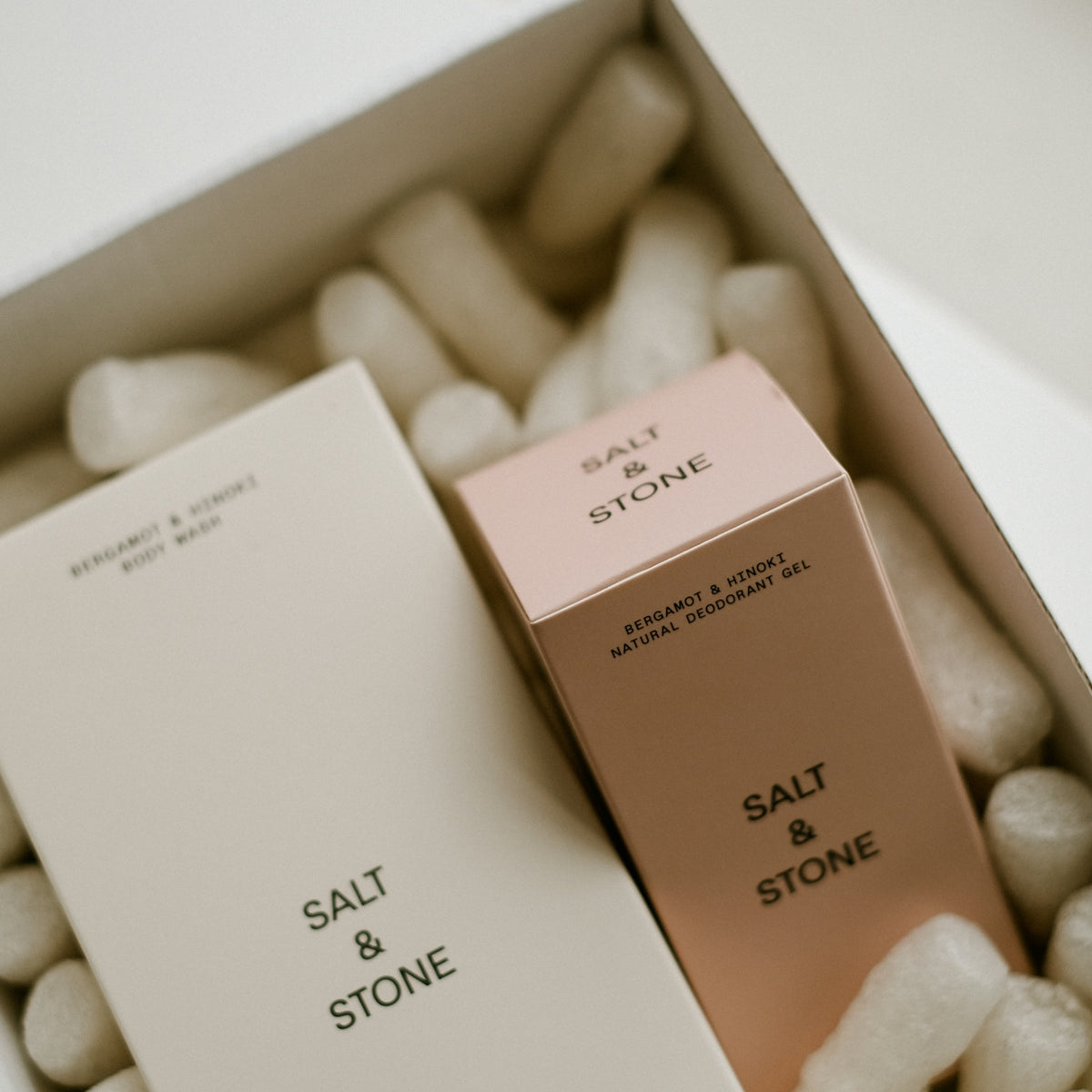 a box of salt and stone is sitting on a table