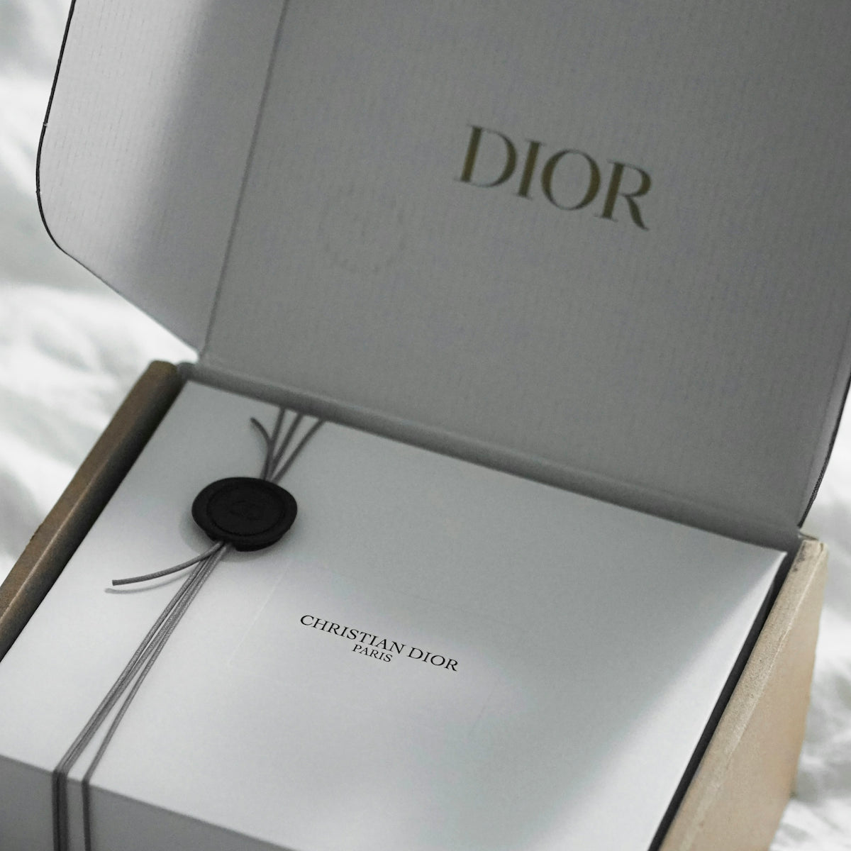 Dior gift box with ribbon and seal