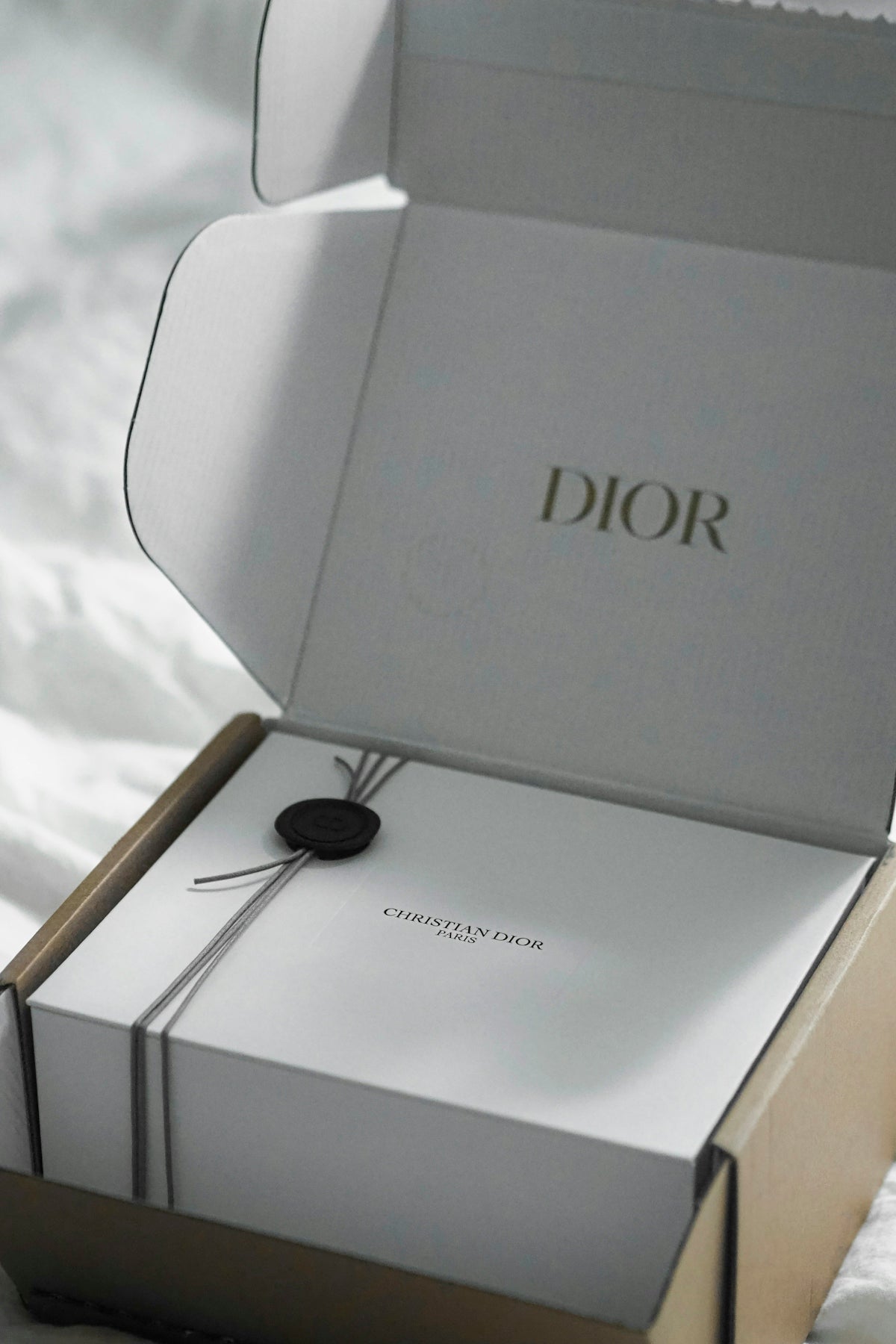Dior box with ribbon and seal
